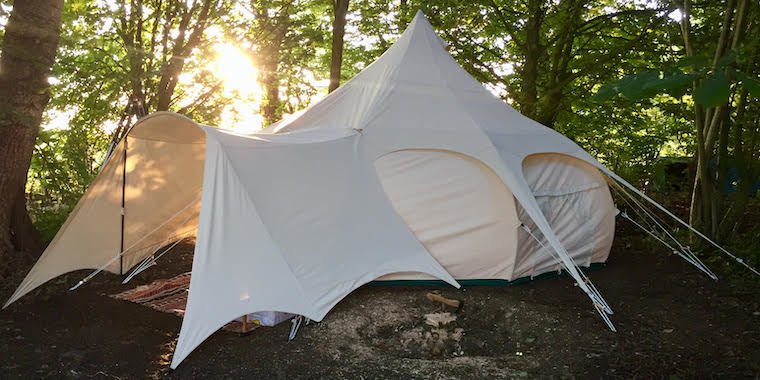Porches, Roof Covers & Canopies - an image of a canvas bell tent porch set up on a tent. Made from bespoke canvas and offering a great solution for extra space on your camping and glamping trips. Lotus Belle